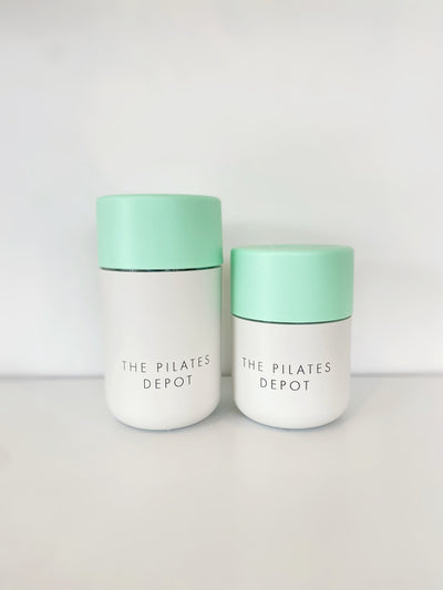 pilates depot frank green coffee cups in two sizes with mint green lids and white bases
