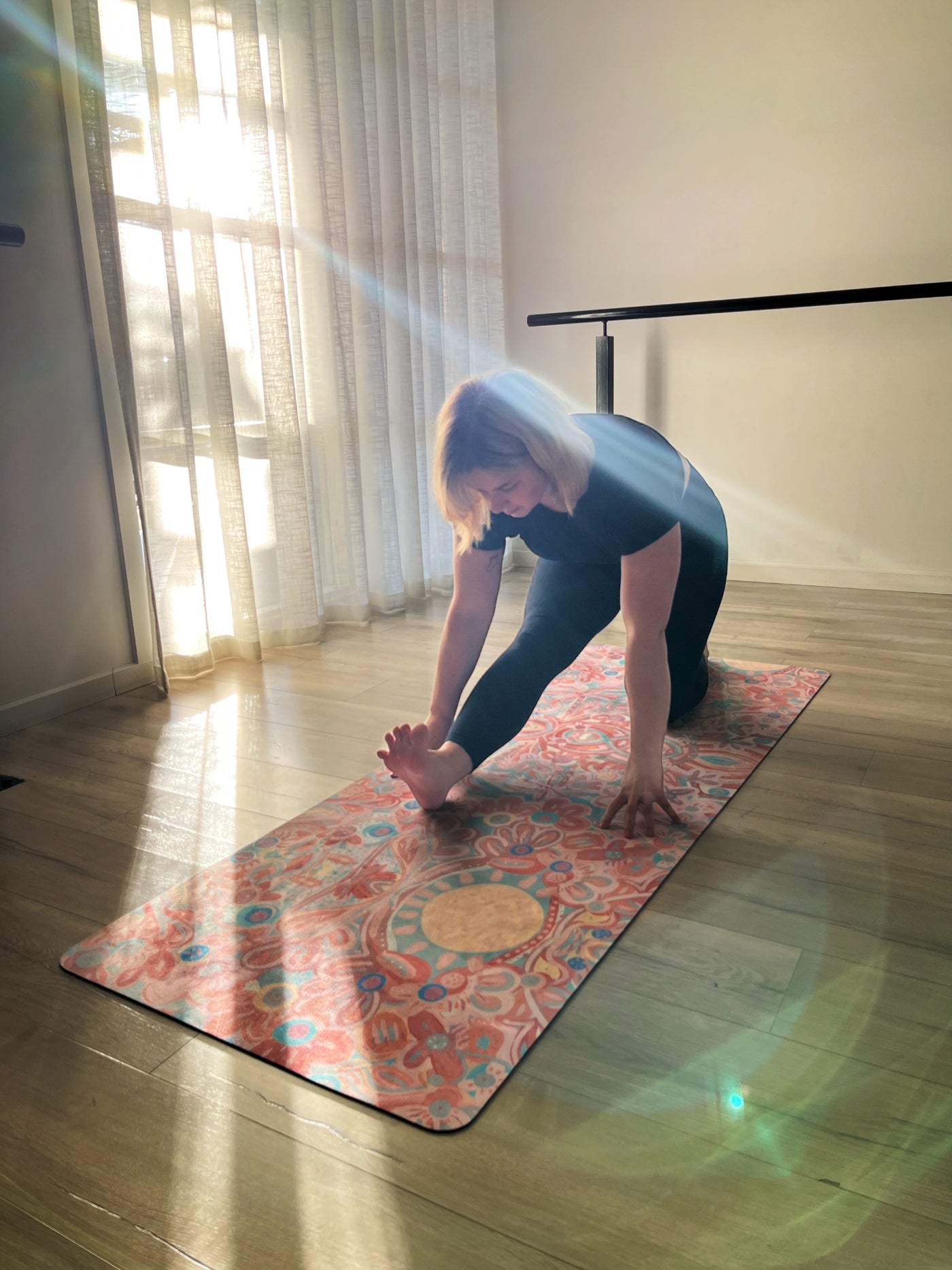 woman in front leg kneeled strech on aurora art you are my sunshine tpd store eco friendly yoga mat