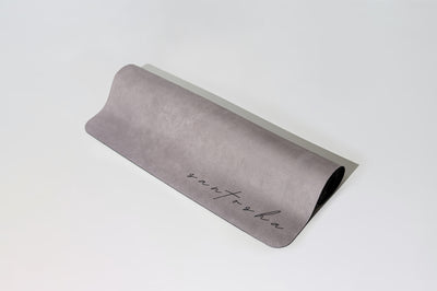 stone colour tpd store santasha eco friendly yoga mat rolled on white background