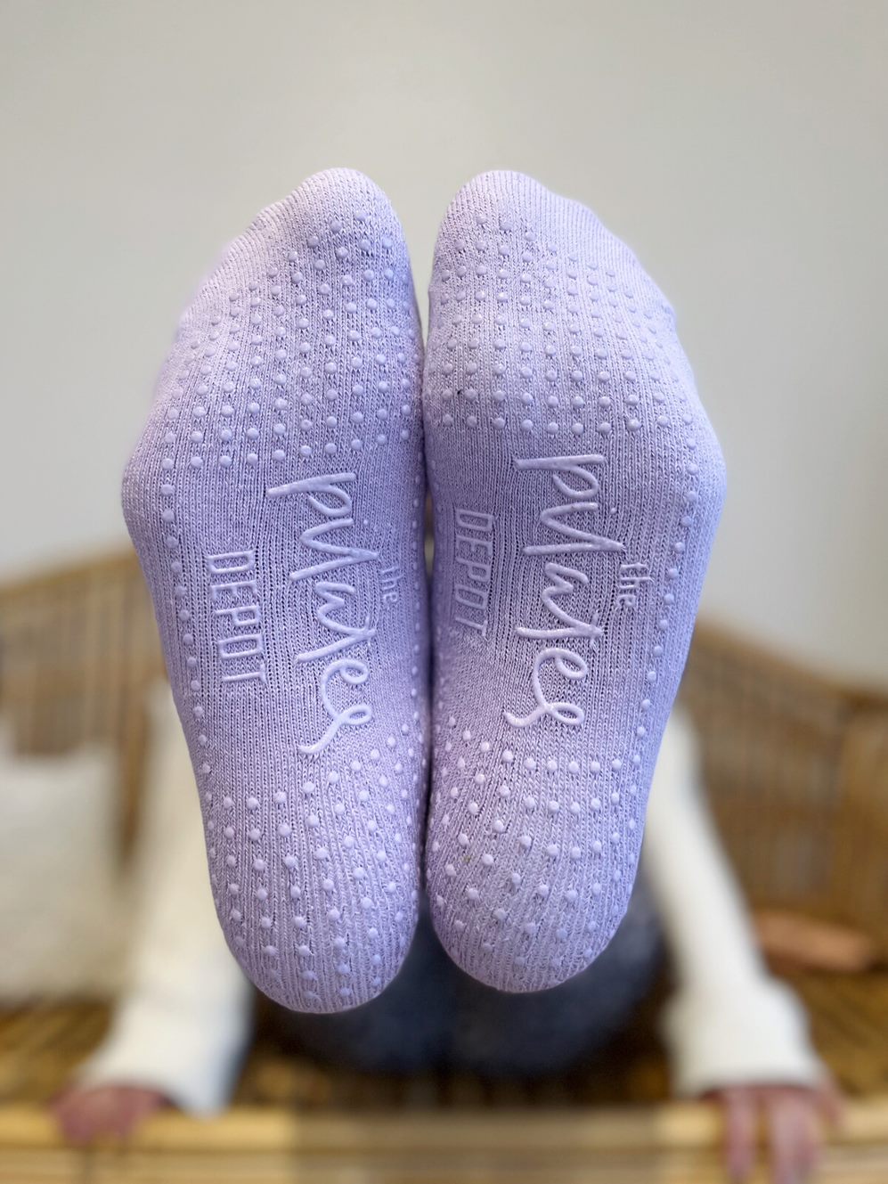soles of two fee in french lialac low rise tpd store grippy socks